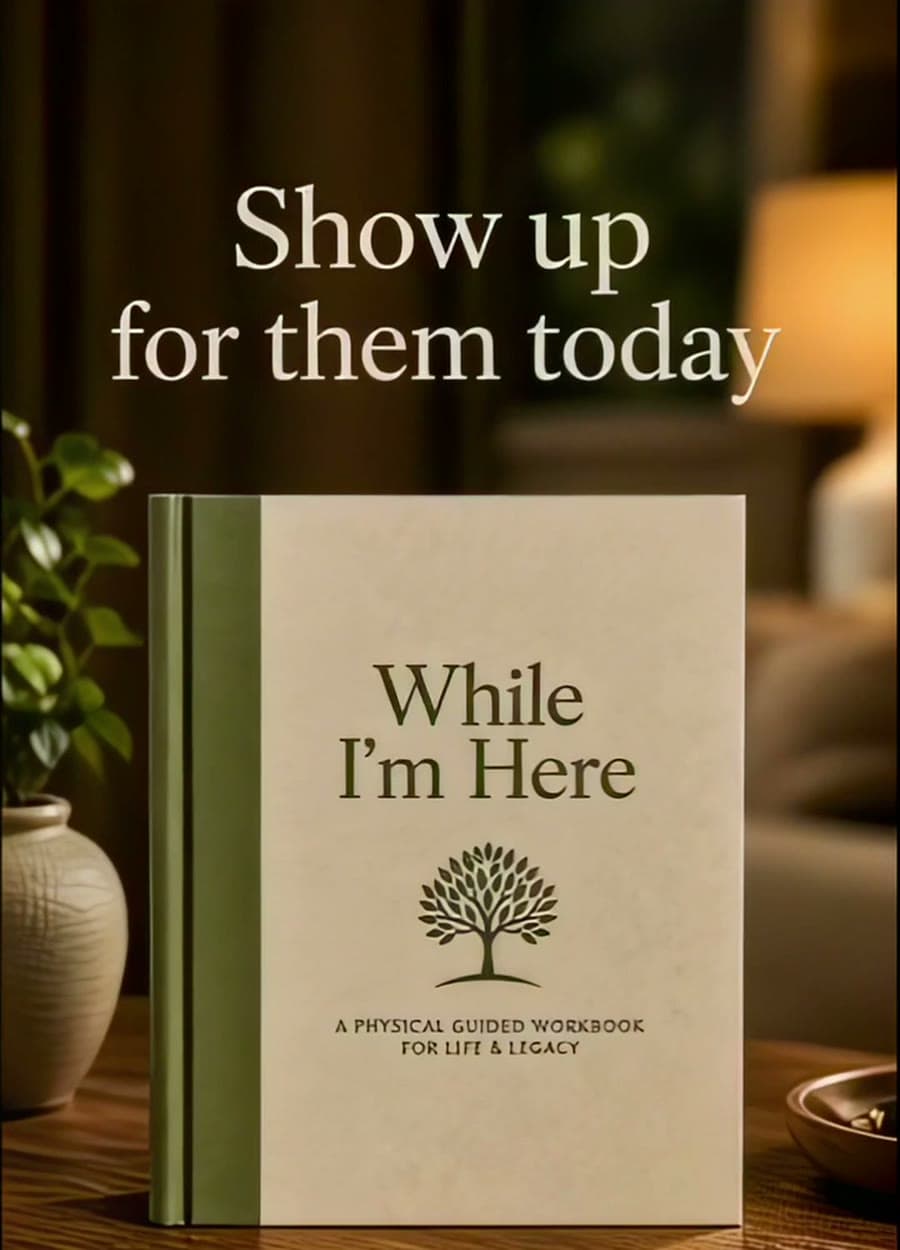 The While I'm Here workbook standing on a sunlit table, beside the words 'Show up for them today'
